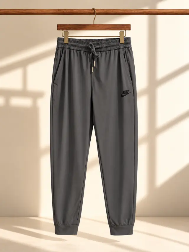 Nike Sportswear Club Woven Jogger رمادي غامق